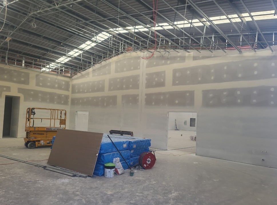 Commercial suspended ceiling and steel stud fit-out in progress